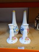 A pair of vintage Poole bottle vases and a pair of Worcester candle sticks