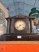 A Victorian style black painted mantle clock and a pencil signed etching by Brenda Hastill