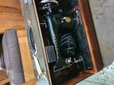 A 1930s Singer 201K sewing machine in leather effect case