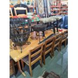 A large pine oblong kitchen table, and set of 6 chairs and a sideboard