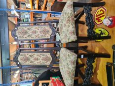 A pair of old carved oak chairs, having high back