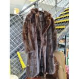 A vintage mink coat by The National Fur company