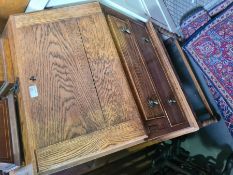 A small Oak bureau having 2 drawers on barley twist supports and a mahogany dressing table