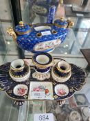 A Sevres boat shaped double ink well and one other having floral decoration