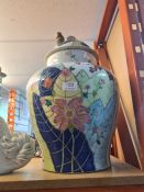 A large 20th Century Chinese ginger jar converted to lamp, (lid damaged) having flower and leaf deco