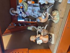 A Continental figure of lady with sheep, a Doulton figure titled Sailor's Holiday and other figures