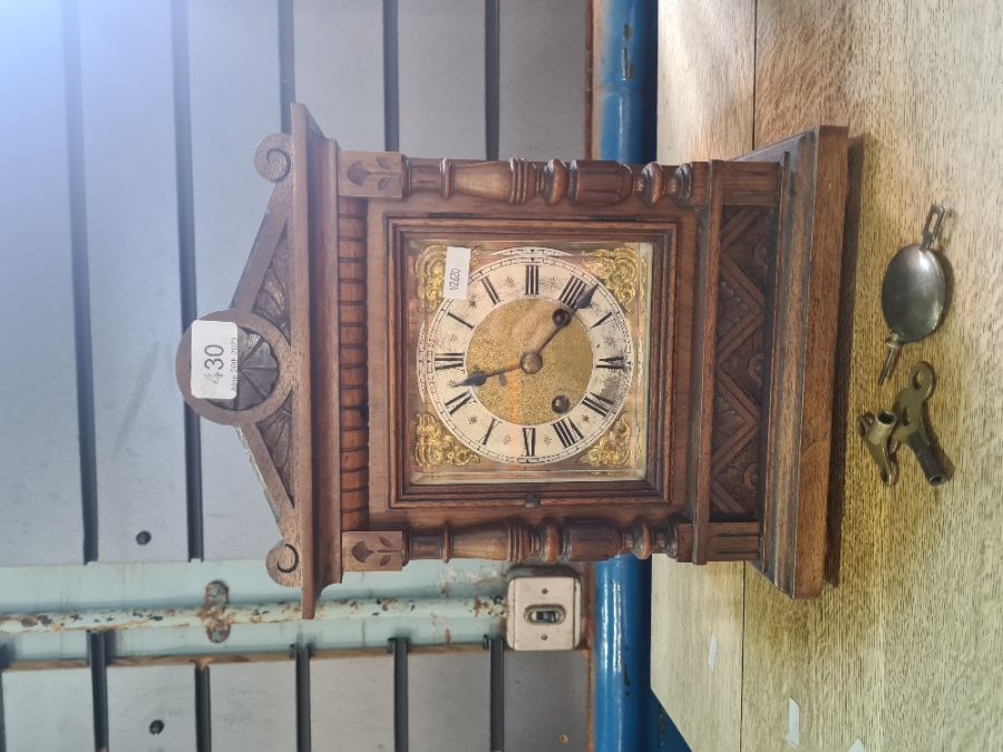A wooden cased mantle clock with brass and painted dial, Roman numerals - Image 3 of 6