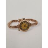 Antique 9ct yellow gold watch with textured dial Roman numerals, on adjustable strap marked 375, app