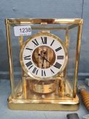 A Jaeger-Le-Coultre. an Atmos 4 glass mantle clock with gold plated decoration. The Atmos clock was
