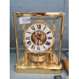 A Jaeger-Le-Coultre. an Atmos 4 glass mantle clock with gold plated decoration. The Atmos clock was
