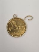 High Carat gold coin in yellow gold mount, marked HANNOVER 986, and the reverse unicorn and lion des