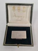 Asprey and Co. Ltd., an attractive, high quality silver Asprey snuff box having engine turned design