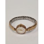 Volga; a ladies 9ct gold cased wristwatch, marked 375, on plated adjustable strap, gross approx 14.8
