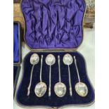 A cased set of six attractive silver Edwardian teaspoons having finials in the form of a duck head.