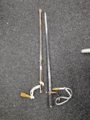 A Modern cavalry sword by Pooley of London having engraved blade with nickle plater scabbard, Househ