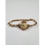 9ct gold cased ladies cocktail 'Record' watch, on 9ct gold expanding bracelet, case and strap marked