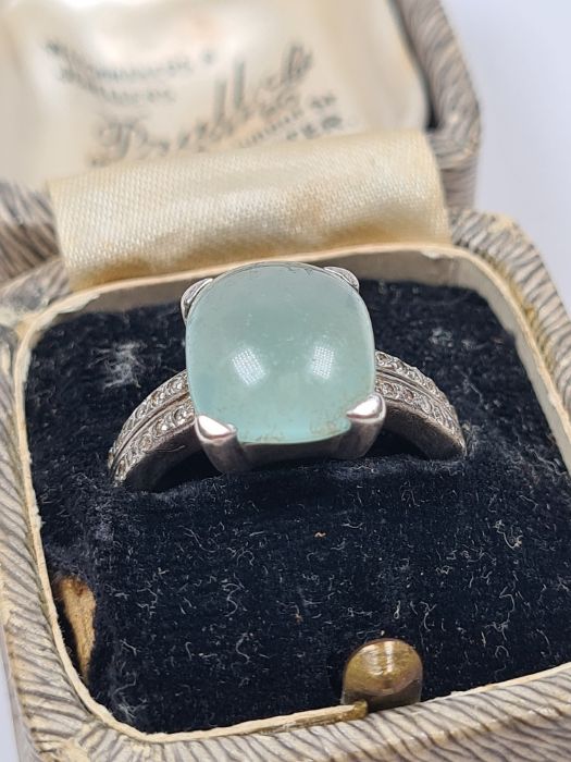 Ti Sento; a silver dress ring with green hardstone, shoulders set cubic zirconia, size N, marked Ti - Image 2 of 2