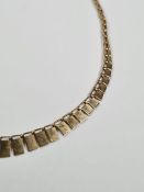 9ct yellow gold necklace with graduating fringe, marked 9ct, approx 4.59g, 41cm