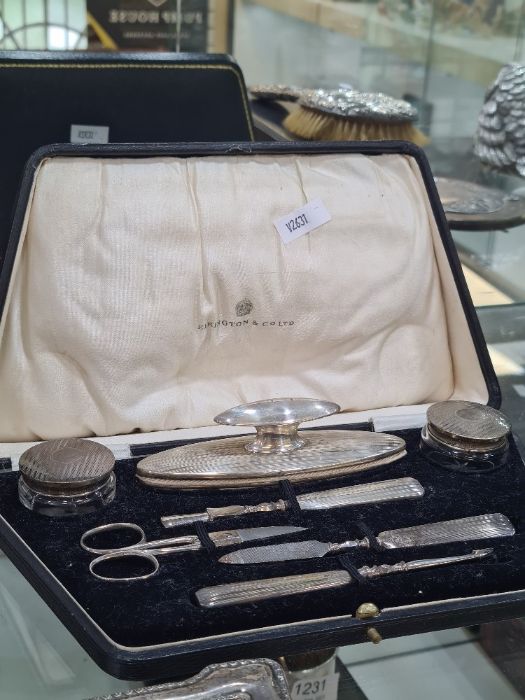 Two cased silver manicure sets, one by Elkington and Co Ltd., Birmingham 1927, also with a five piec - Image 3 of 5