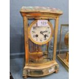 An old onyx and gilt metal 4 glass mantle clock with compensated pendulum