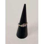 Platinum and diamond crossover design trilogy ring, marked platinum, size M, approx 3.59g