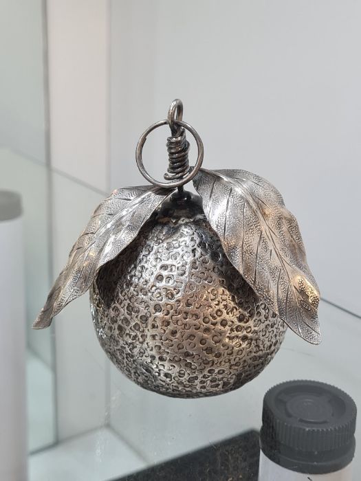An Italian silver 20th Century silver ornament in the form of an orange with leaves, marked 800. The - Image 2 of 5