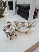 A silver perfume burner marked A M 830, in the shape of an urn. Lion embossed details and standing o