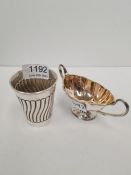 A silver Victorian cup having reeded body, hallmarked Chester 1892 Stokes and Ireland Ltd, also with