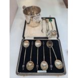 A Thomas Smily silver Victorian spoon hallmarked London 1865, another spoon, a pair of tongs having