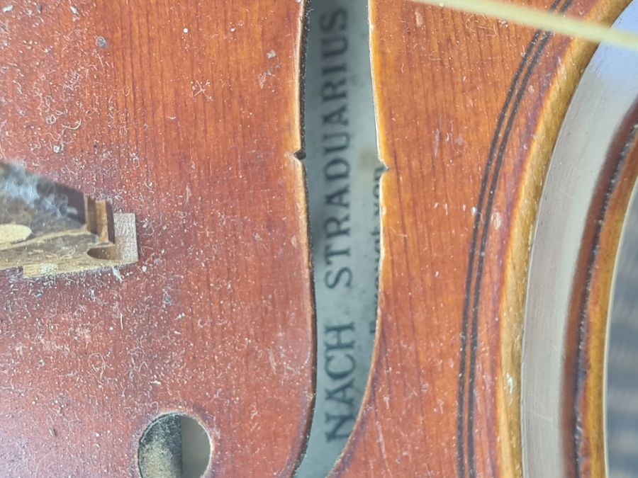 An old Violin having label for Nach Stradavarius with two bows and case, length 14" back - Image 6 of 6