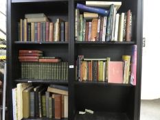A selection of mostly hardback books on various subjects including Winnie the Pooh, etc