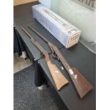 Two old air rifles, one having mahogany butt