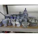 A large selection of oriental china, including lidded vases, cups, plates and bowls, etc