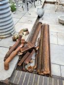 A quantity of old cast iron guttering, pipes and similar