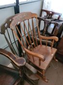 Two rocking chairs, one is a small child's rocking chair