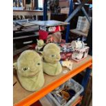 A selectin of Star Wars collectables including mugs, tins, masks, slippers, etc