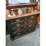 An antique early 18th century style chest having four long graduated drawers, 96cms