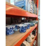 A quantity of modern oriental style blue and white items, mainly bowls and plant pots