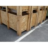 Four wooden packing crates with lids