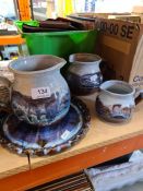 Three greystoke Gill graduated pottery jugs and a matching plate