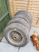 A set of 4 vintage multi-spoke wheels, probably from a Jaguar  Type, or an Aston Martin