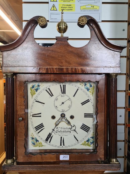 A long case clock with painted dial with the inscriptions Wm. Carter, Salisbury, with key
