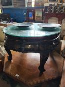 A modern Chinese lacquer circular coffee table having marble and bone decoration of flying Cranes, w