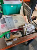 A box of ephemera consisting of vintage postcards, books, birthday cards, etc