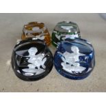 Four Bacarat paperweights depicting Royalty