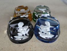 Four Bacarat paperweights depicting Royalty