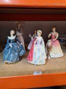 Four Royal Doulton lady figures, one signed by Michael Doulton, and one Nao figure