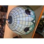 A large leaded Tiffany style ceiling lamp