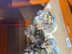 7 Danbury Mint seaside models for the RNLI collection with C.O.A. and one other item