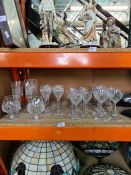 A quantity of crystal glasses including brandy, wine, champagne, etc